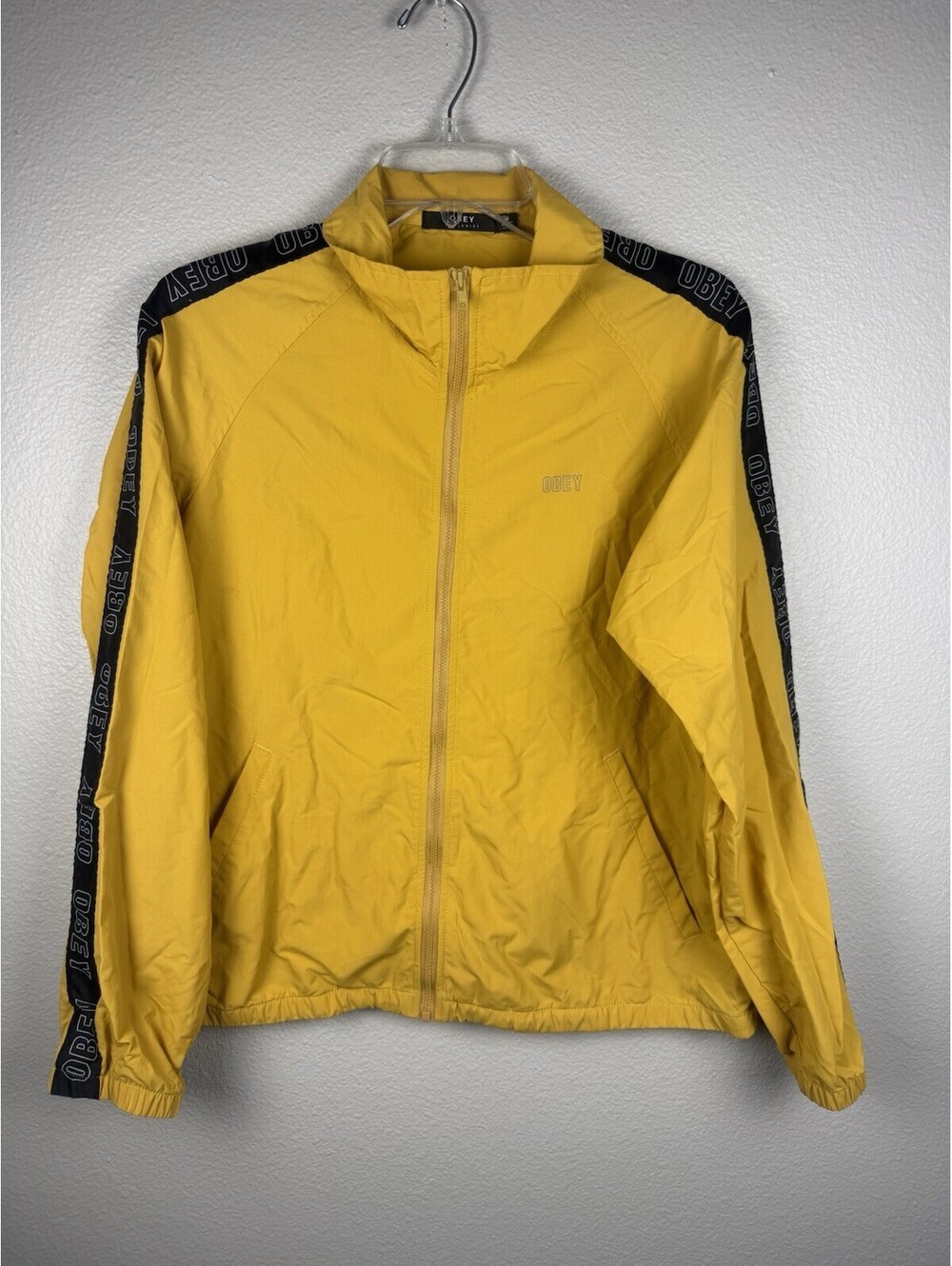 OBEY Worldwide Mens M Yellow Windbreaker Jacket Logo Tape Sleeve Streetwear